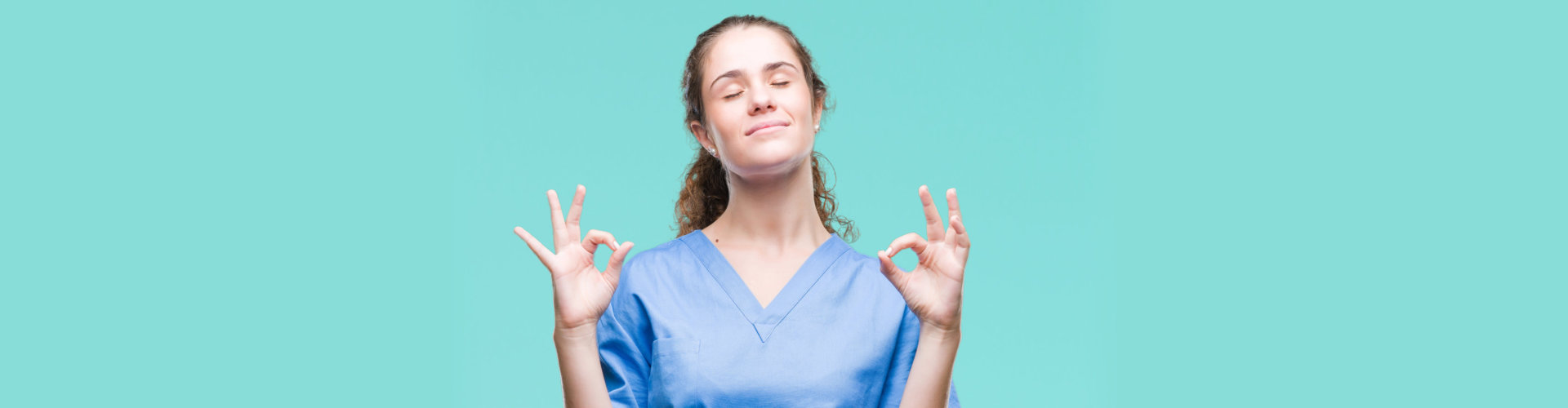 a female nurse closing her eyes